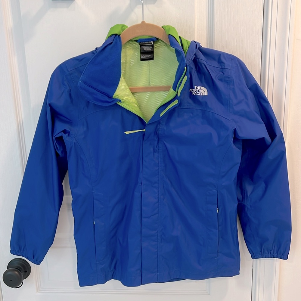 The North Face rain jacket/windbreaker with hood. Size 10/12